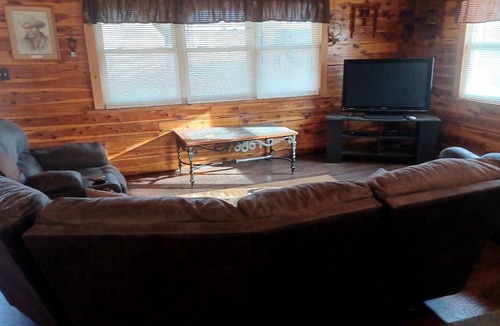 Fittstown House | Deluxe log home with 57 acres on 1/2 mile of the SO. Canadian river. Sleeps 6.