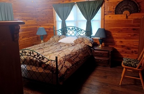 Fittstown House | Deluxe log home with 57 acres on 1/2 mile of the SO. Canadian river. Sleeps 6.