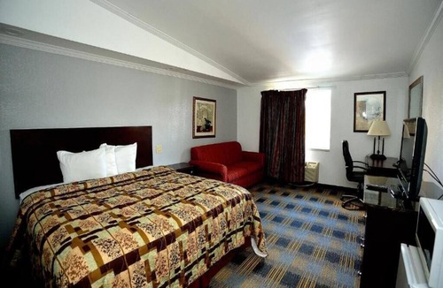 Somerset Hotel | DELUXE ROOM, KING BED