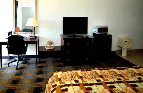 Somerset Hotel | DELUXE ROOM, KING BED