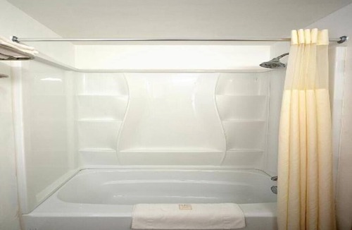 Somerset Hotel | DELUXE ROOM, KING BED