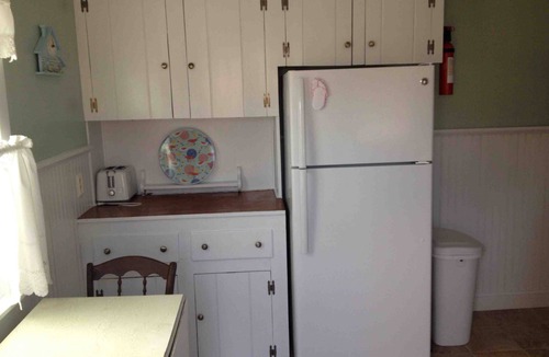 Dennis Port Cottage | Dennisport : Dog Friendly with a fenced in large yard. 1/2 mile from beach.