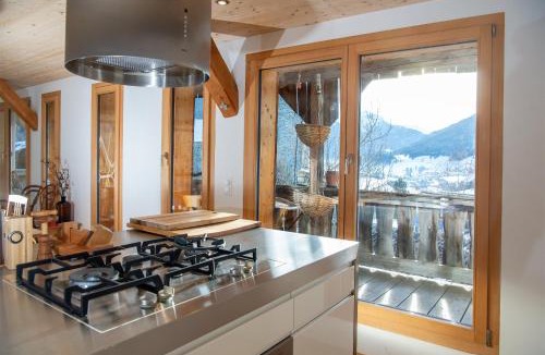 Riom-Parsonz House | Design chalet with Alpine panorama
