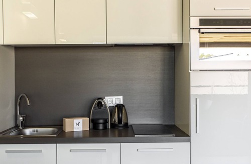 Santa Giulia Apartment | Design Studio private terrace Santa Giulia beach