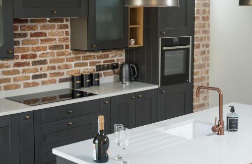 Leighterton House | Designer Cotswold post house with external sauna