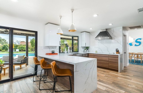 Continental Foothills House | Designer dream home with opulent backyard, private pool, hot tub, game room & AC