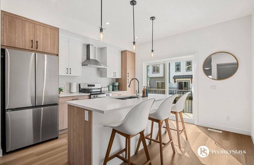 Springbank Hill House | Designer-Inspired Home » King Bed » Garage » AC #21