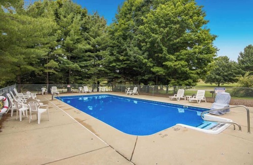Bellaire Condo | Designer Studio at Shanty Creek, Pool & Beach