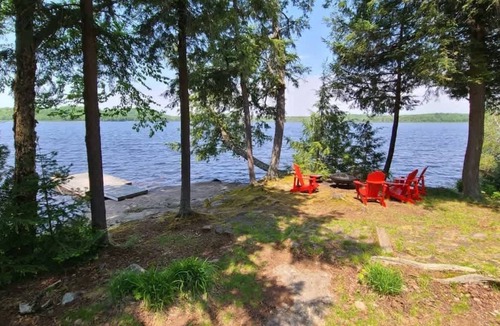 Baysville Cottage | Designer Waterfront Retreat l Dock Kayaks Firepit