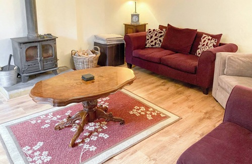 Kettlewell Cottage | Detached barn conversion with side terrace overlooking the river.