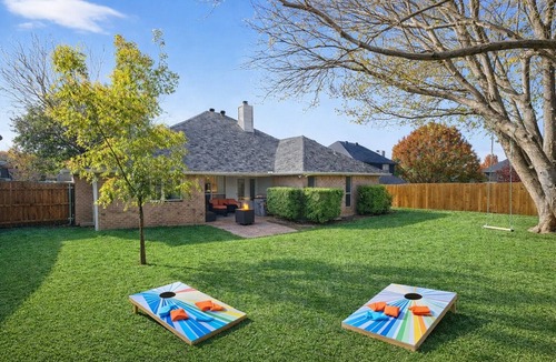 North Richland Hills House | DFW Family Fun Retreat Pool Table Air Hockey Arcade Game Work Space BBQ Firepit