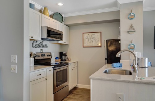 Boyne City Condo | Direct Lake Charlevoix Access | First Floor Beach Retreat | Private Patio |