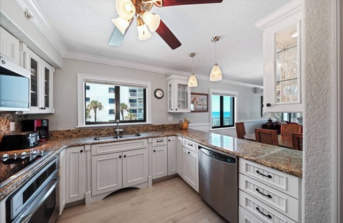 New Smyrna Beach Condo | Direct oceanfront corner 3/2 with a large wrap around balcony and heated pool