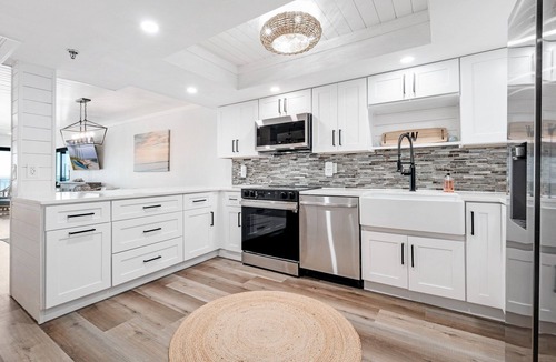 New Smyrna Beach Condo | Direct oceanfront 2/2 with a large balcony, heated pool, and beach access