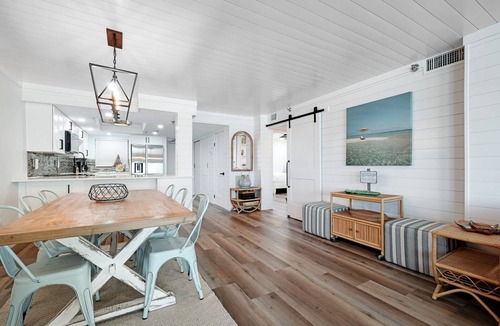 New Smyrna Beach Condo | Direct oceanfront 2/2 with a large balcony, heated pool, and beach access