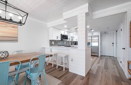 New Smyrna Beach Condo | Direct oceanfront 2/2 with a large balcony, heated pool, and beach access