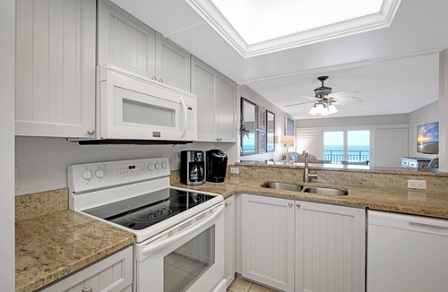 New Smyrna Beach Condo | Direct oceanfront 2/2 with private balcony, heated beachfront pool, and beach access