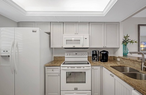 New Smyrna Beach Condo | Direct oceanfront 2/2 with private balcony, heated beachfront pool, and beach access