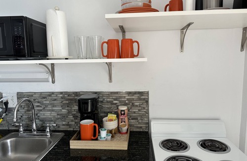 Bostwick Park Apartment | Direct Oceanfront Studio with Balcony, King Bed, Kitchenette, and Wifi