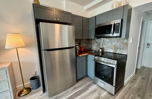 Mid Beach Condo | Directly on the Beach with Pool & Ocean access !