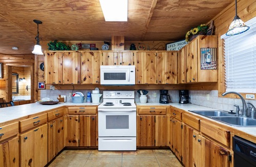 Sabinal House | Directly ON the Frio River with exclusive river frontage, shuffleboard table & room for 25 guests