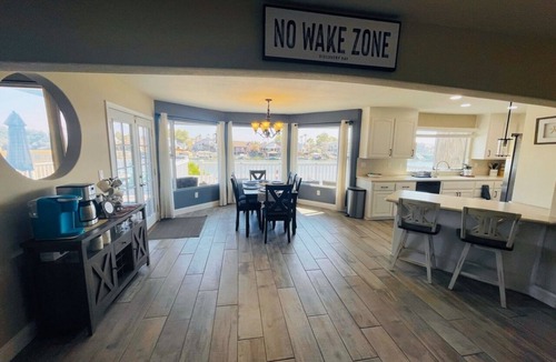 Discovery Bay House | DiscoBay Waterfront Getaway w/Game Room, Video Games, Deck & Water toys
