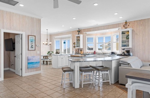 Caswell Beach House | Discover Peace on the Beach, a stunning 6BR, 5BA oceanfront retreat in Oak Island.