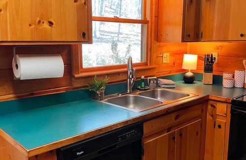 Hidden Lake Cabin | Discover tranquility at Hidden Oasis, a charming home nestled in serene Cherry Log Mountain