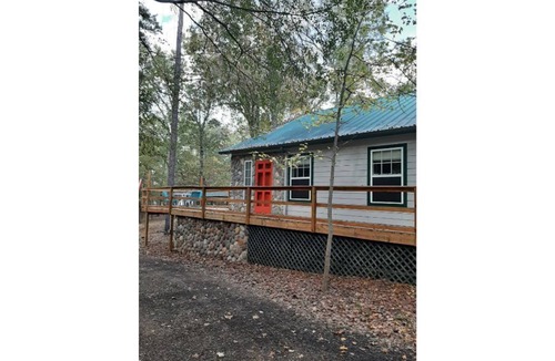 Hawkins House | Dock Holiday is a lakefront home with hot tub. Bring your fishing pole.