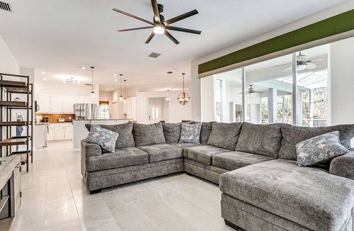 Land O' Lakes House | Dock, Lanai & Pool! Modern Red Bug Lake Retreat