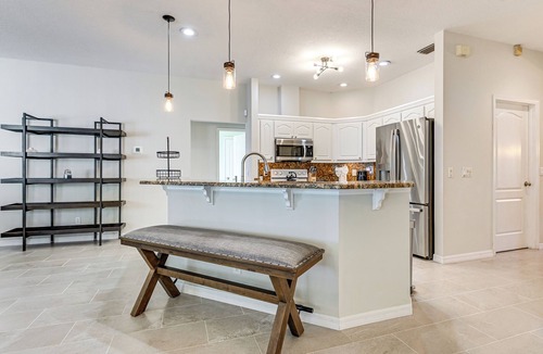 Land O' Lakes House | Dock, Lanai & Pool! Modern Red Bug Lake Retreat