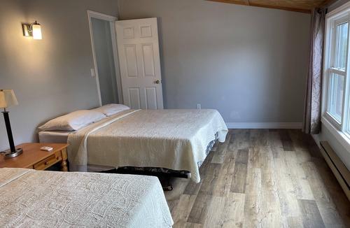 Wasaga Beach Cottage | Dock Life Beach 1 - Upper Unit 17, Riverview 4 bedroom, 3 min walk to Beach 1