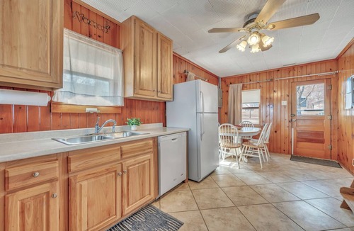 Spirit Lake Cottage | Docksid days & Sunrise mornings on East Lake- Private dock- sleeps 10
