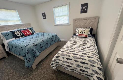 Clarksville House | Dockside Dreamz 2 with beach & dock