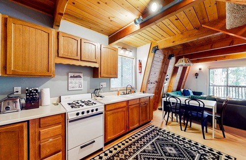 Crestline House | Dog-friendly 2-story home with large deck, tree views, fireplace, & W/D