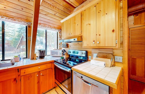 Tahoe Pines House | Dog-friendly A-frame cabin with 2 decks & fireplace - walk to the beach