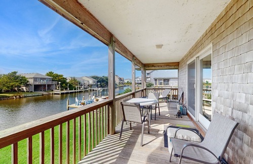 Brigands' Bay House | Dog-friendly, canal-front house with dock, balcony, deck, & central AC