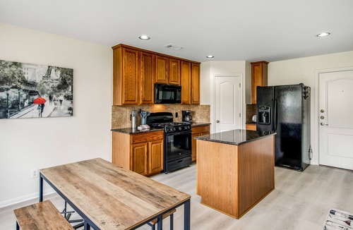 Pioneer Crossing House | Dog-Friendly City Escape with a Large Yard, Gas Grill, Free WiFi, & Full Kitchen