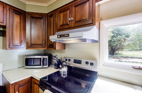 North Creek House | Dog-friendly cottage with a wood stove, washer/dryer, firepit, & large yard