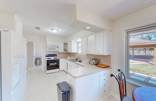Westbury House | Dog-friendly downtown home with pavilion, grill, enclosed yard, streaming, patio