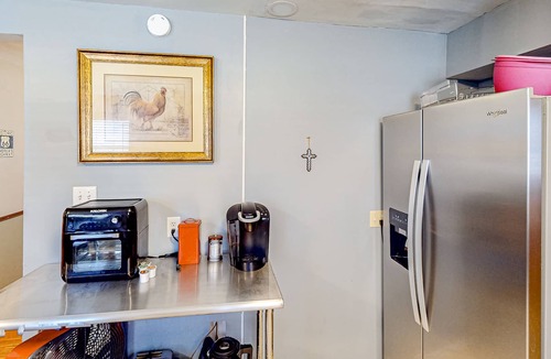 Tower Heights House | Dog-friendly home with large yard, grill, & basketball hoop