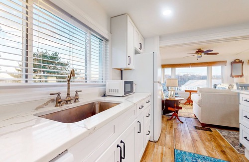 Beverly House | Dog-friendly home with a partial river view & deck - steps from park & beach