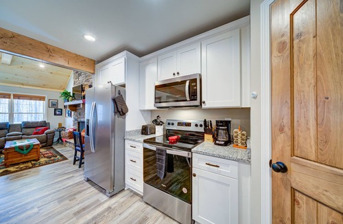 Eagle Mountain Cabin | Dog-friendly home with wraparound deck, firepit, grill, WiFi, and pool