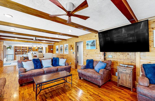 Garfield House | Dog-friendly home with lake views, washer/dryer, pool, basketball & fireplace