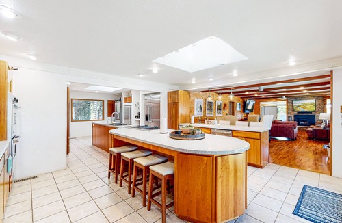 Garfield House | Dog-friendly home with lake views, washer/dryer, pool, basketball & fireplace