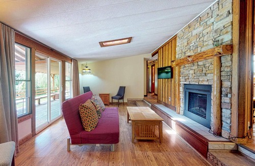 Covington House | Dog-friendly house & studio w/ a deck, private hot tub, firepit, & large yard