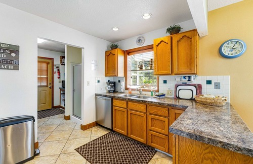 Kiwanda Shores House | Dog Friendly House with Ocean Views Hot Tub Arcade Machine and Easy Beach Access