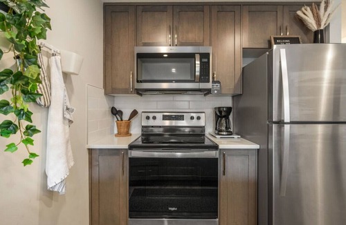 Northwest Calgary Villa | Dog Friendly » King Bed » Free Banff Pass » AC