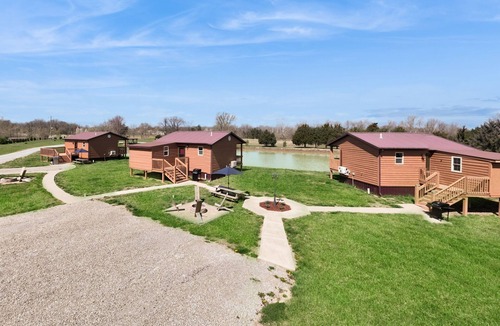 Murphysboro Cabin | Dog-friendly, lakefront cabins with firepit, porches & pond - great for groups