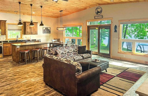 Minocqua House | Dog-friendly lakefront hideaway with docks, firepit, fireplace & W/D